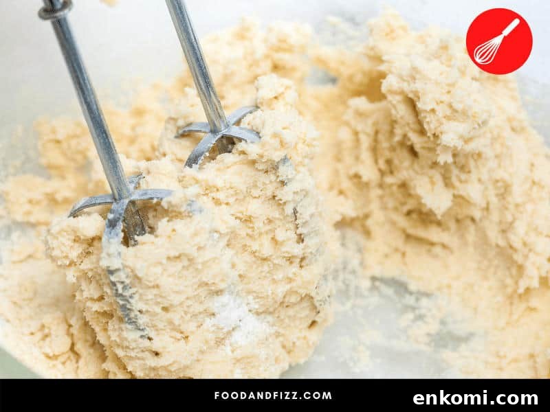 Consistency and temperature of the dough are very important to ensure that it will work properly in the cookie press. Too stiff and too cold doughs can clog the cookie press.