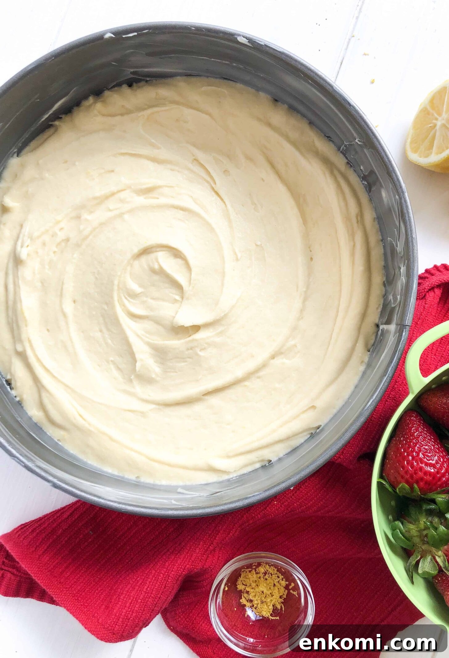 Gluten-Free Lemon Vanilla Cake Recipe for Light, Zesty Dessert 3 Cake batter in a spring form pan ready to be baked