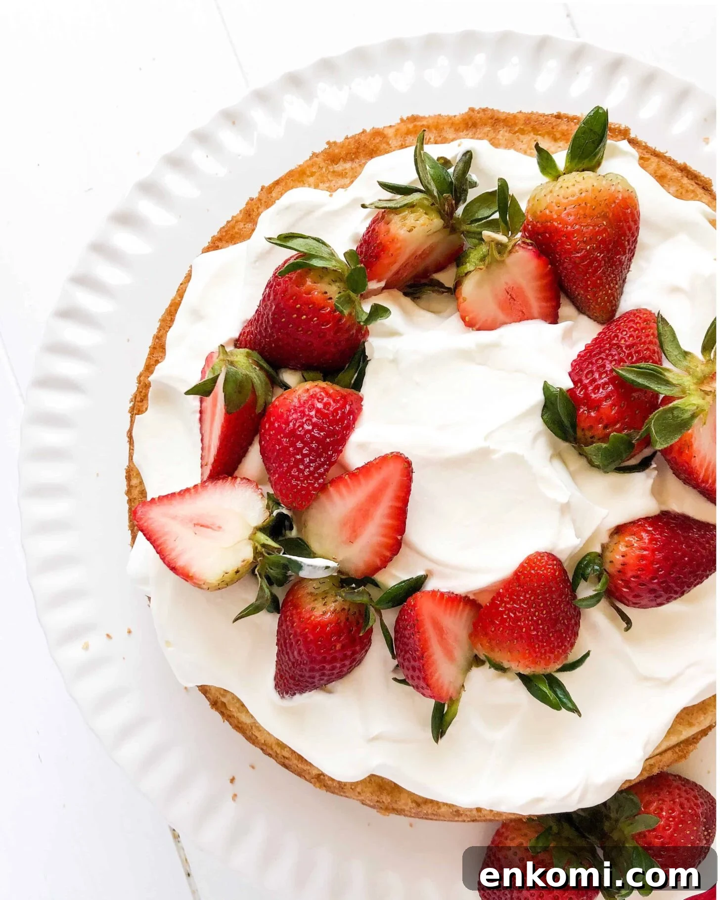 Gluten-Free Lemon Vanilla Cake Recipe for Light, Zesty Dessert 5 A gluten free lemon vanilla cake with strawberries and cream