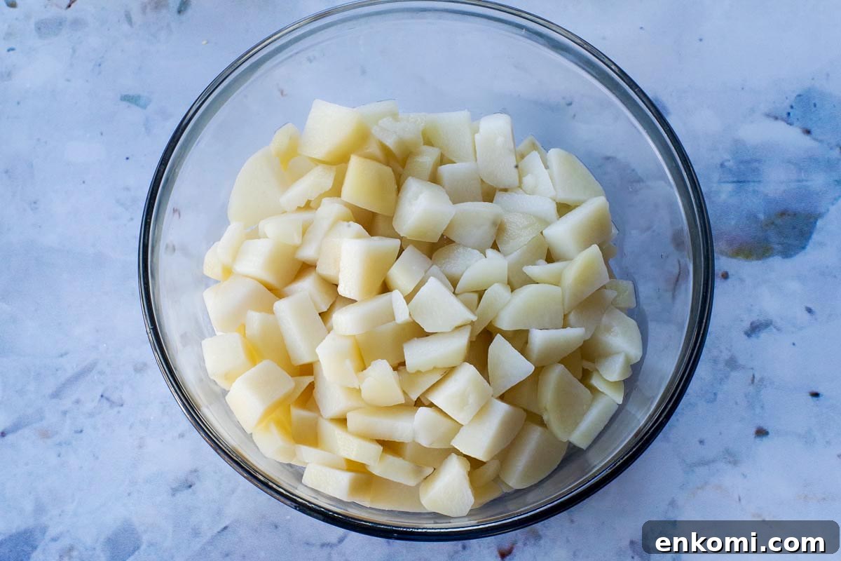 Weight Watchers Potato Salad Recipe — Light & Flavorful 6 Potatoes cooked, drained and chilled in a large glass bowl.