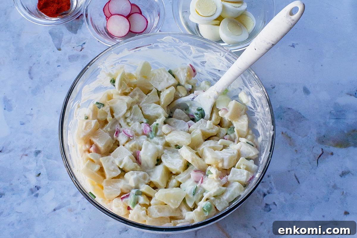 Weight Watchers Potato Salad Recipe — Light & Flavorful 9 Potato salad ingredients mixed together in a bowl.
