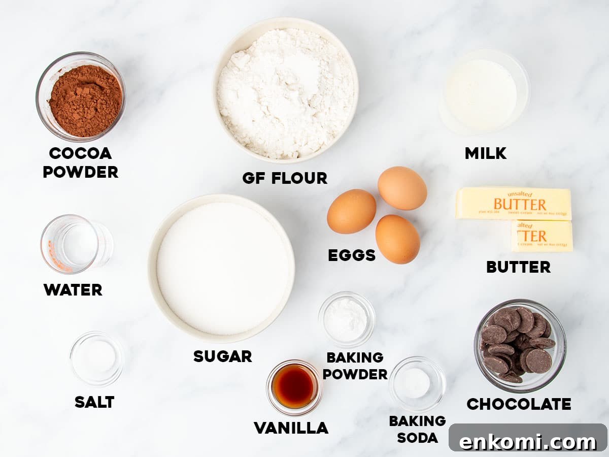 overhead image of gluten free chocolate bundt cake ingredients in small bowls with black block letters with names of each listed