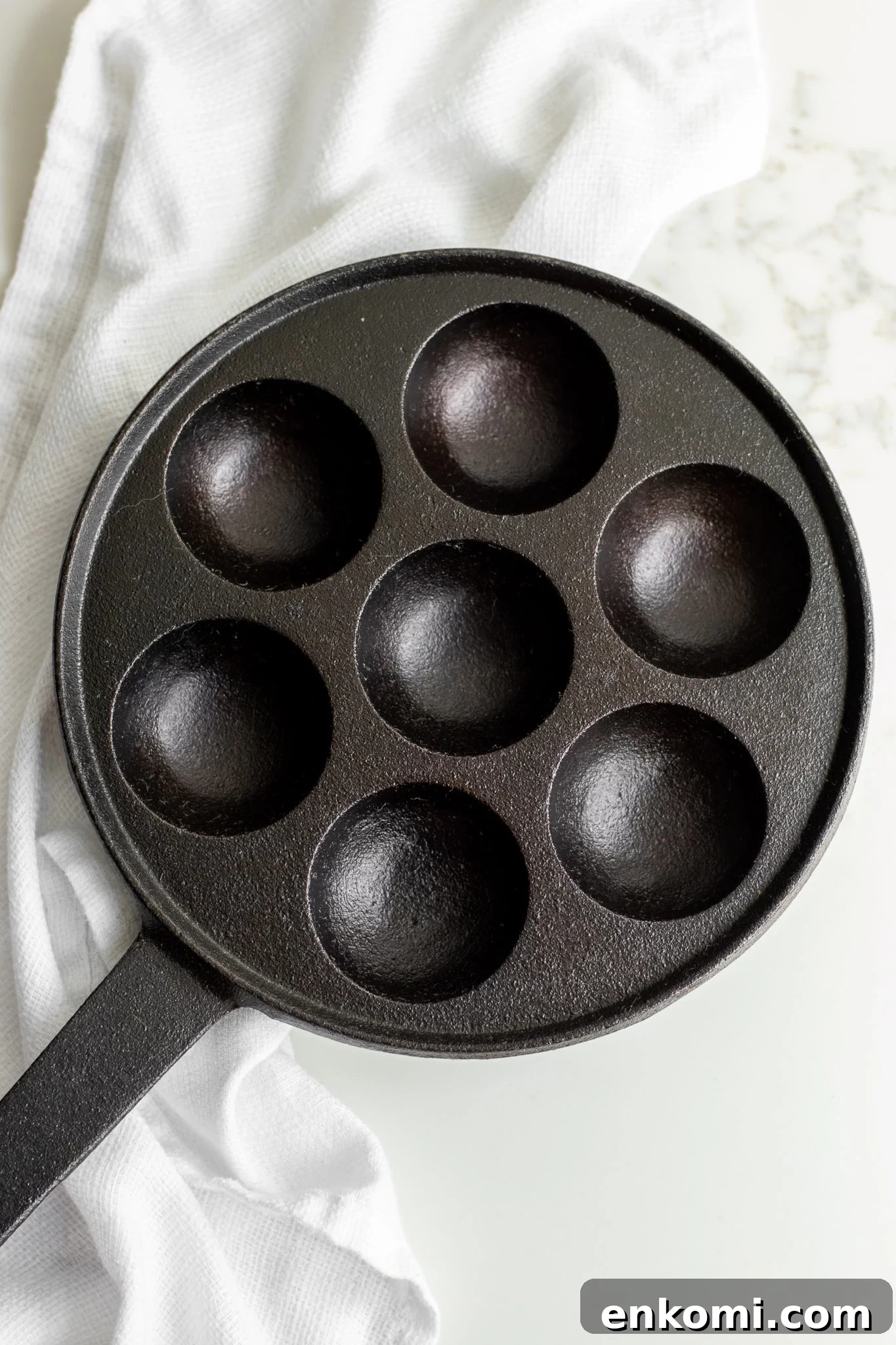 A pan for making danish aebleskiver.