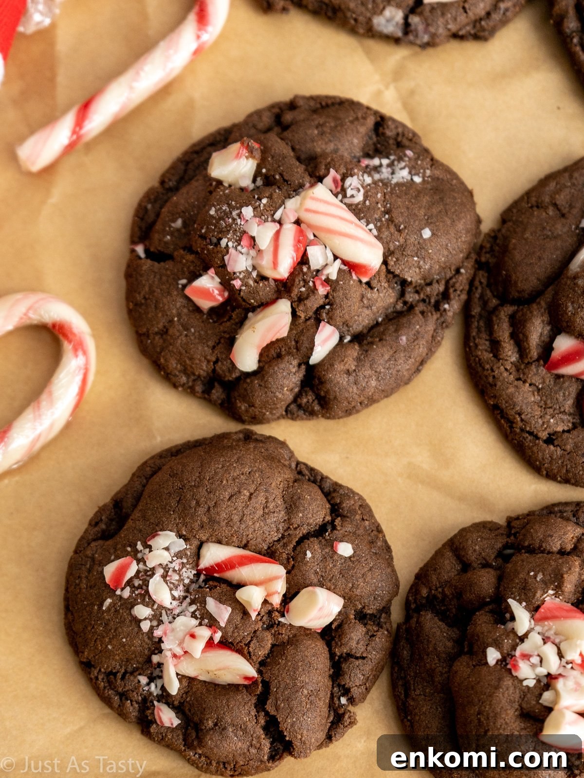Close-up of chocolate cookies topped with crushed candy canes.