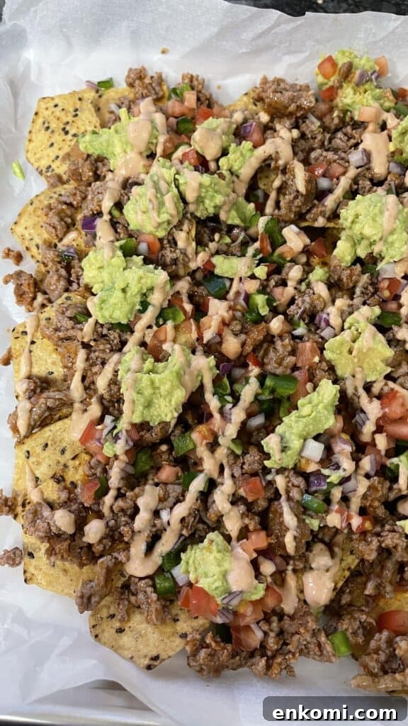 Family-Style Sheet-Pan Meat Nachos for Feeding a Crowd 2 sheet-pan meat nachos