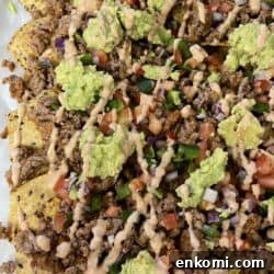 Family-Style Sheet-Pan Meat Nachos for Feeding a Crowd 3 sheet pan meat nachos