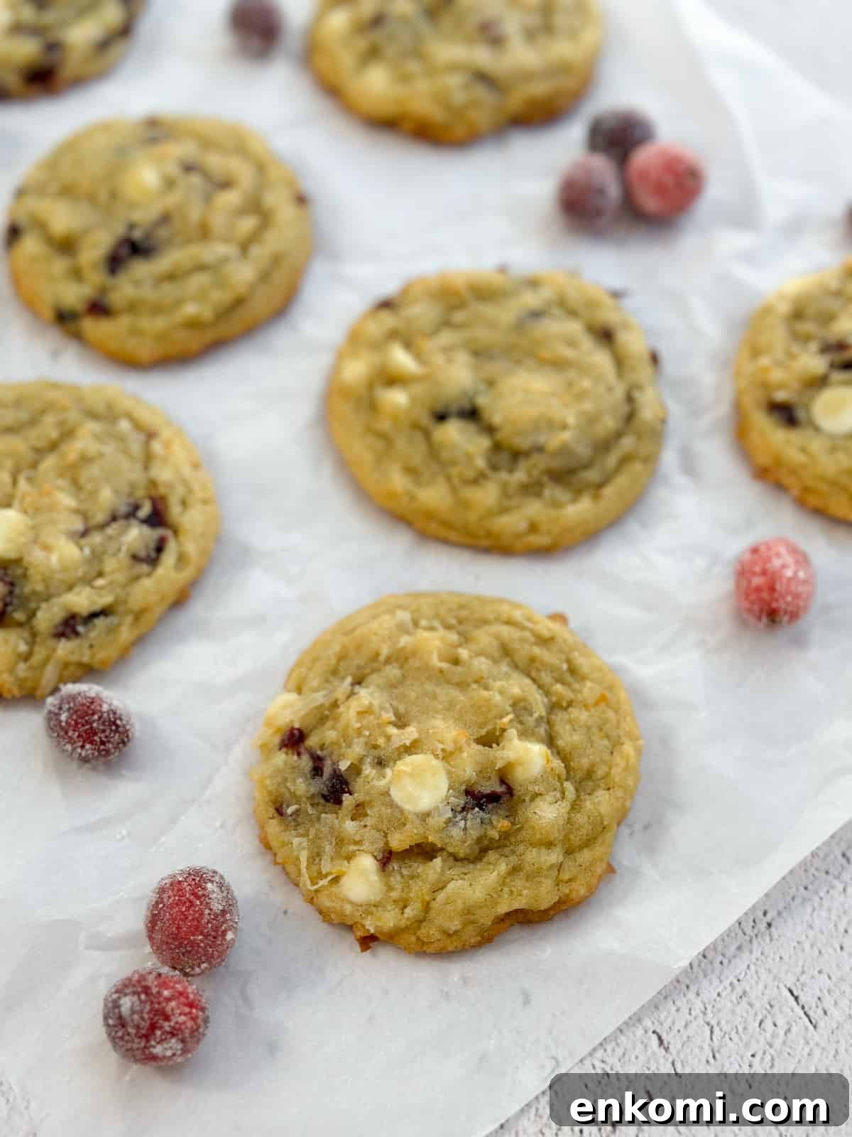 White Chocolate, Cranberry & Orange Cookies — Holiday Citrus Treats 13 a side view of some white chocolate orange cranberry cookies.