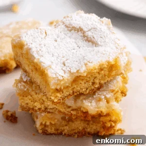 A stack of three cream cheese bars.