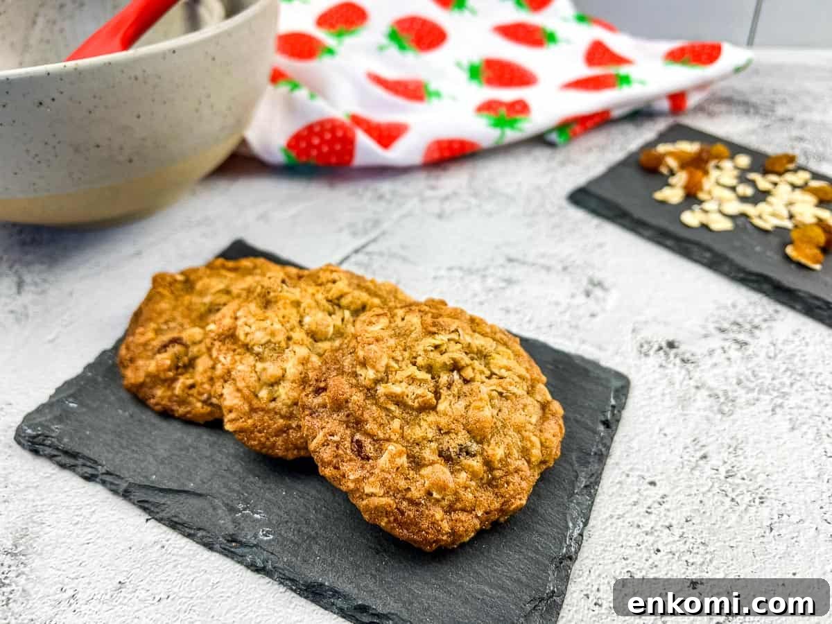 29 Fall Desserts That Bring Generations of Flavor Together 4 Oatmeal Raisin Cookies on a slate.