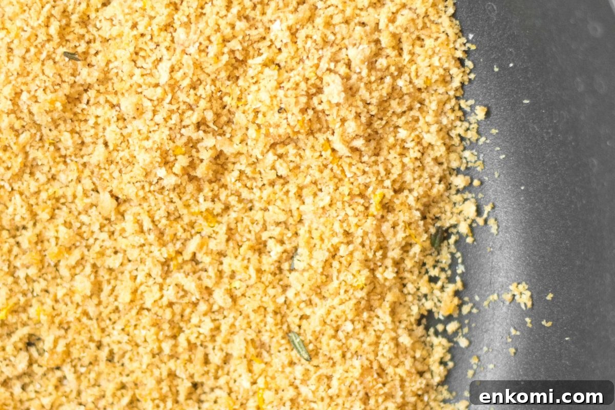 up close toasted breadcrumbs in a black pan