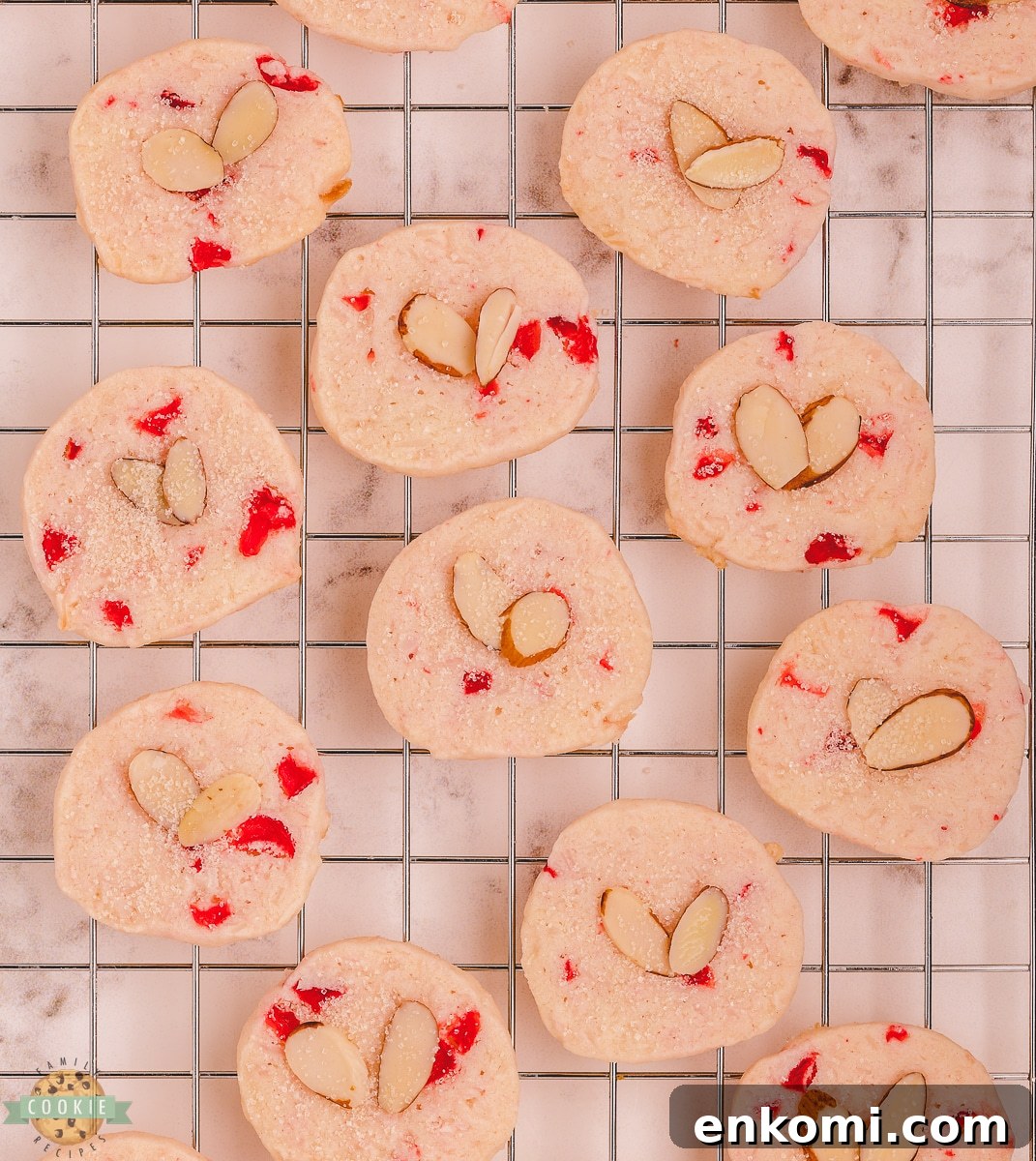 coconut almond cherry shortbread on a cooling rack
