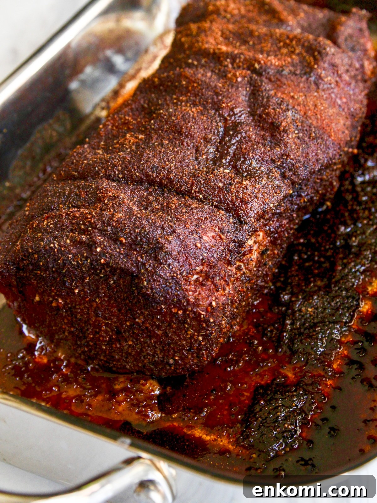 Juicy Oven-Roasted Pulled Pork 9 Cooked pork loin in roasting pan