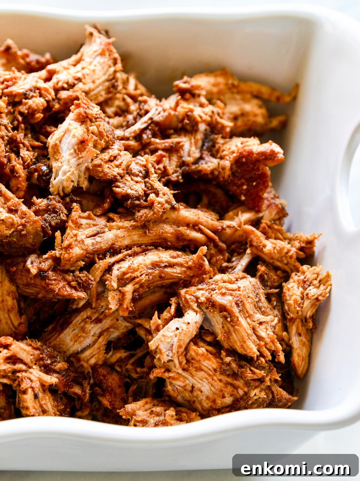 Juicy Oven-Roasted Pulled Pork 3 Close up pulled pork in white dish