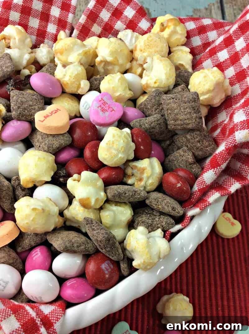 Close up of the cherry muddy buddy snack mix.