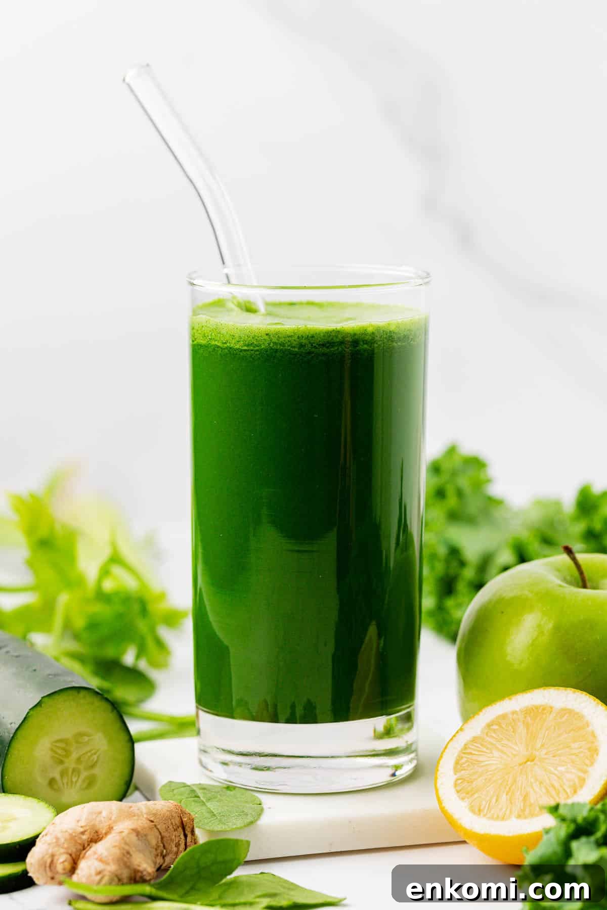 Refreshing Homemade Green Juice Recipe for Energy and Detox 14 green juice in a glass with a straw