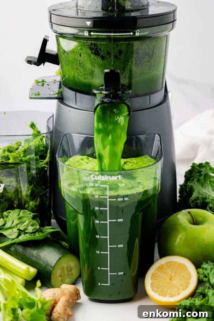 Refreshing Homemade Green Juice Recipe for Energy and Detox 5 green juice pouring out of a juicer