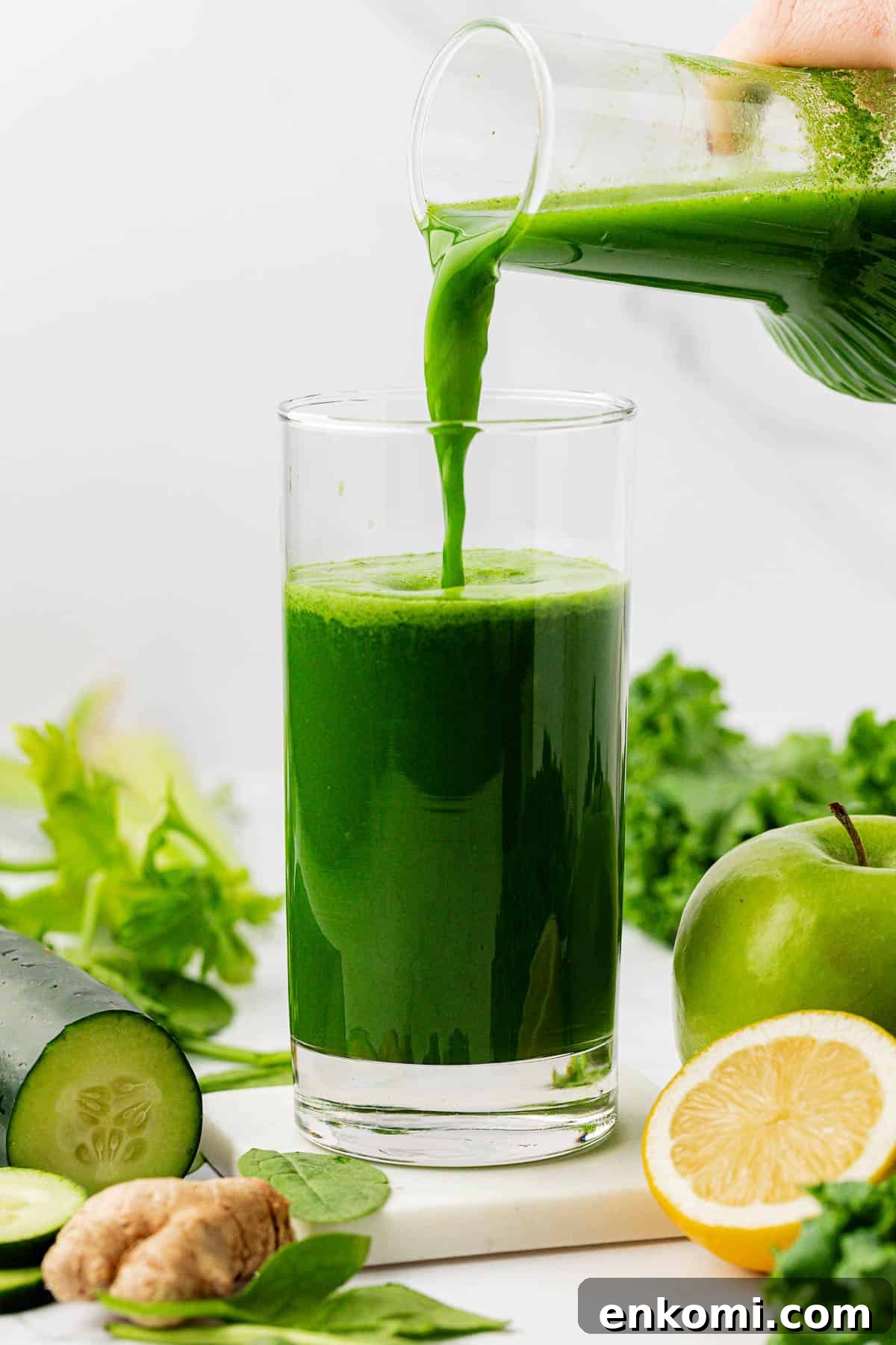 Refreshing Homemade Green Juice Recipe for Energy and Detox 7 pouring green juice into a glass