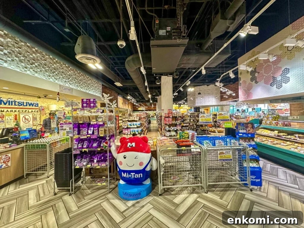 Inside Mitsuwa Marketplace in Waikīkī with a colorful display of Japanese grocery items.