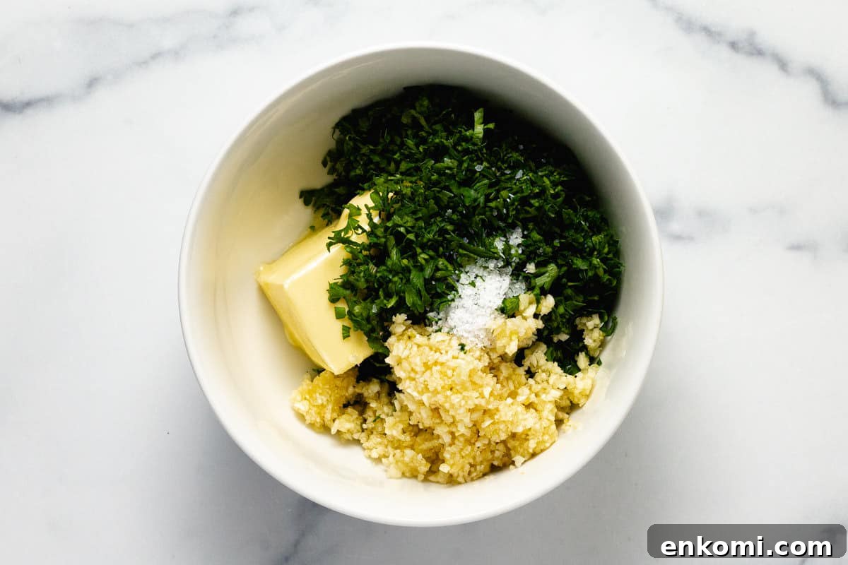 Small bowl filled with ingredients to make homemade garlic butter