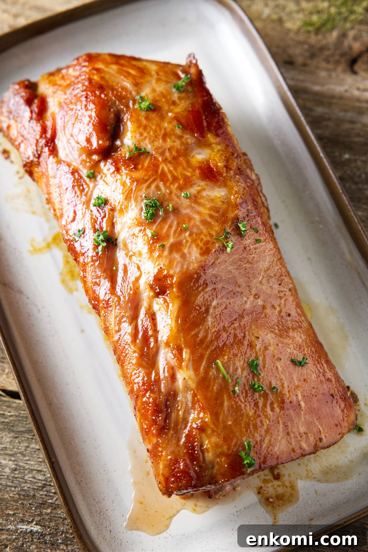 Pork Loin vs Pork Chop: Which Cut Should You Cook? 3 whole smoked pork loin resting on plate