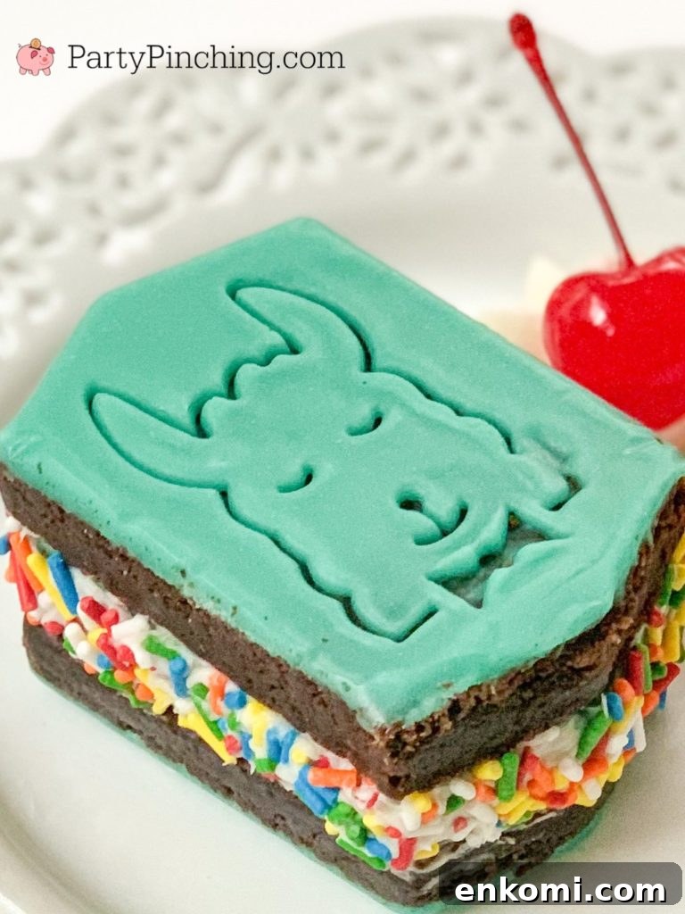 llama ice cream sandwiches, little debbie llama brownies, best ice cream sandwich recipe, best brownie ice cream sandwich recipe, ice cream sandwich with rainbow sprinkles, teal frosting icing, best llama party ideas, party pinching