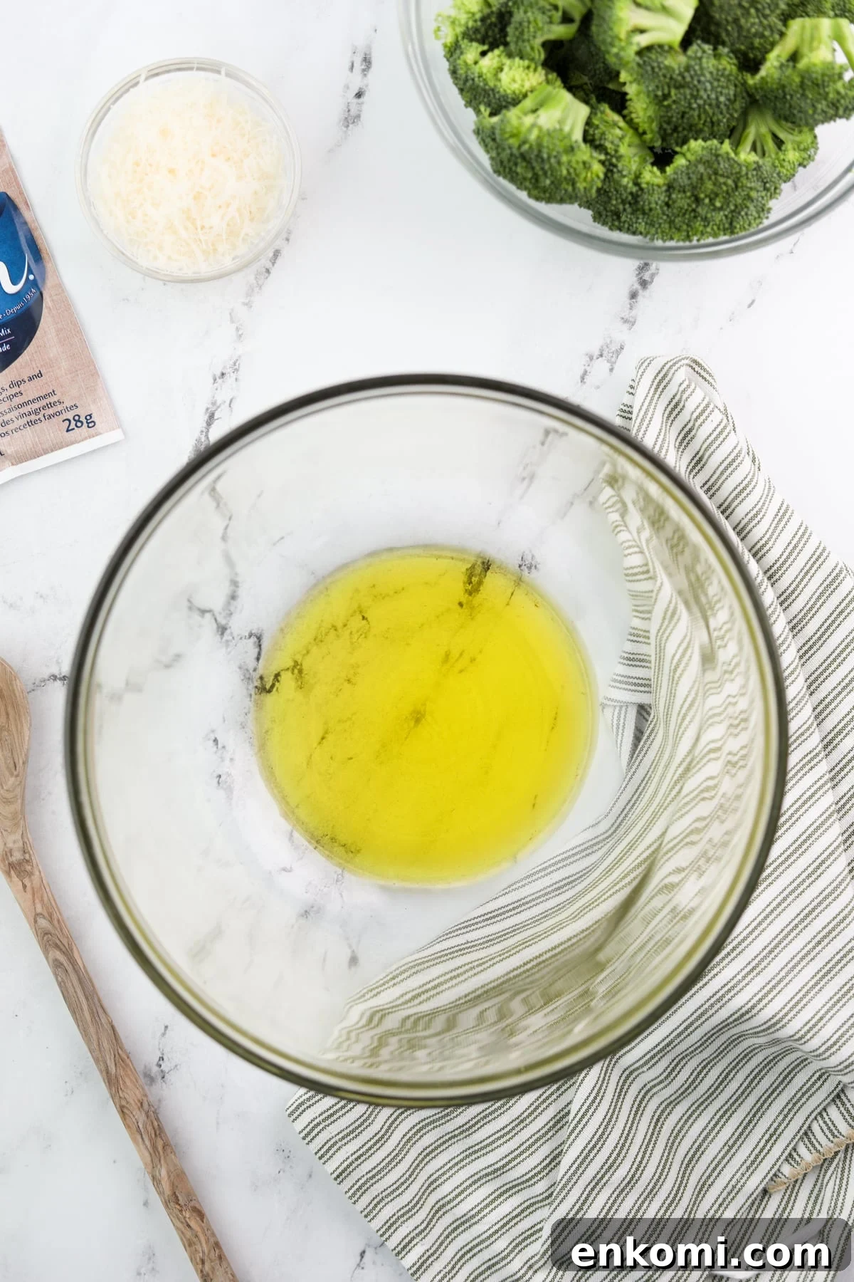 A bowl with olive oil in it.