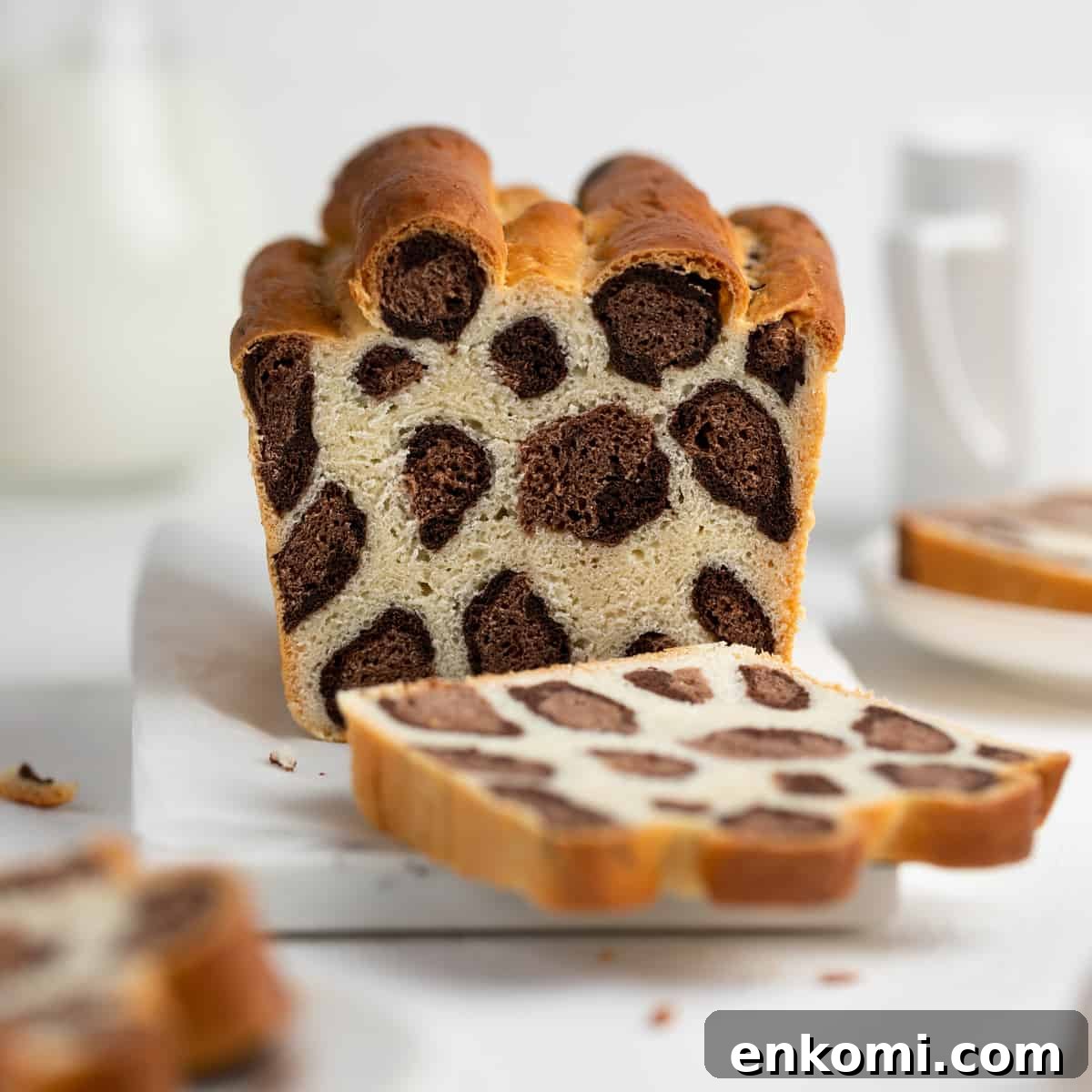 Leopard Milk Bread: Soft Spotted Loaf Recipe 2 Sliced leopard bread on a white cutting board
