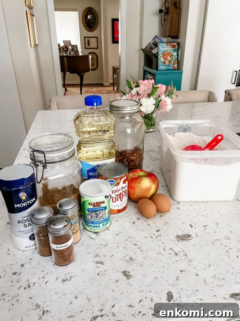 Pumpkin Apple Bread Recipe with Warm Fall Spices 3 The ingredients for the Fall Pumpkin Apple Bread set out on a counter