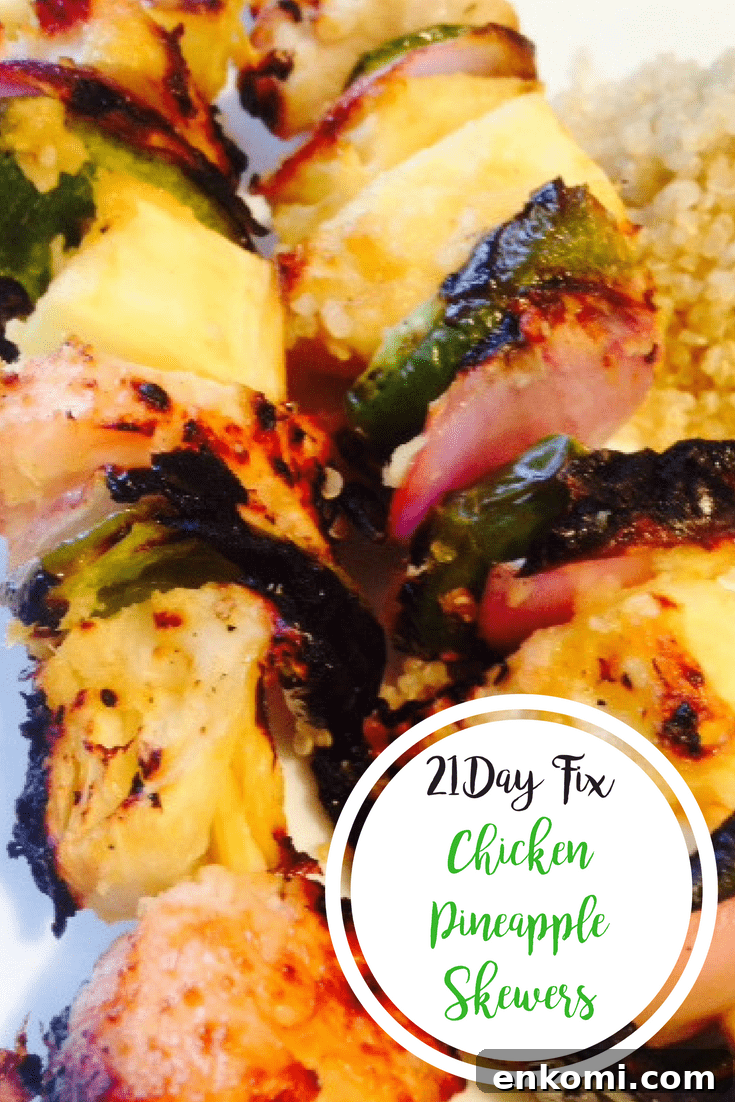 Diced chicken, pineapple, green pepper, and red onion are threaded on skewers and grilled, with the text overlay 21 Day Fix Chicken Pineapple Skewers