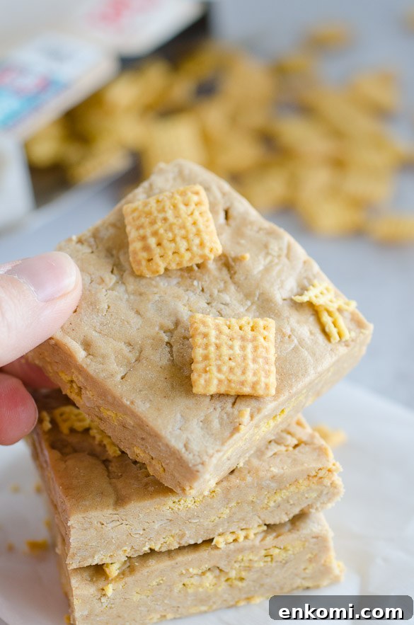 Picking up a protein bar topped with Chex cereal