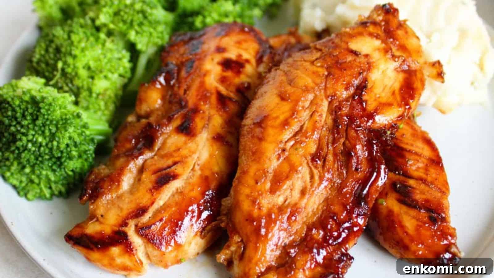 31 Spring Dinners That Feel Fresh, Not Fussy 29 A plate with honey chicken tenders, broccoli florets, and mashed potatoes.