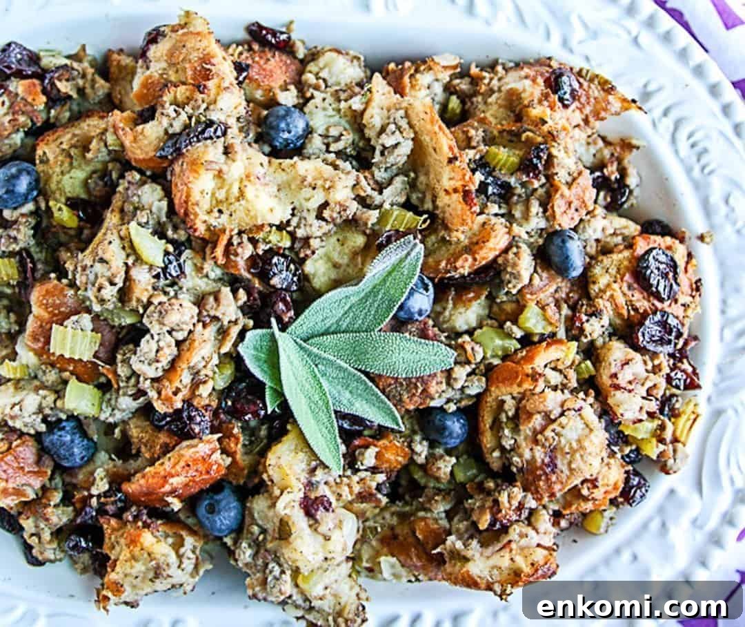 Blueberry Sourdough Sausage Stuffing for Thanksgiving 4 A plate of food, with Stuffing