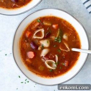 overhead shot of soup in white and gray bowl