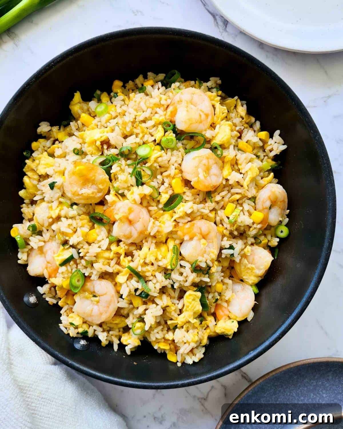 Freshly made fried rice in a black frying pan