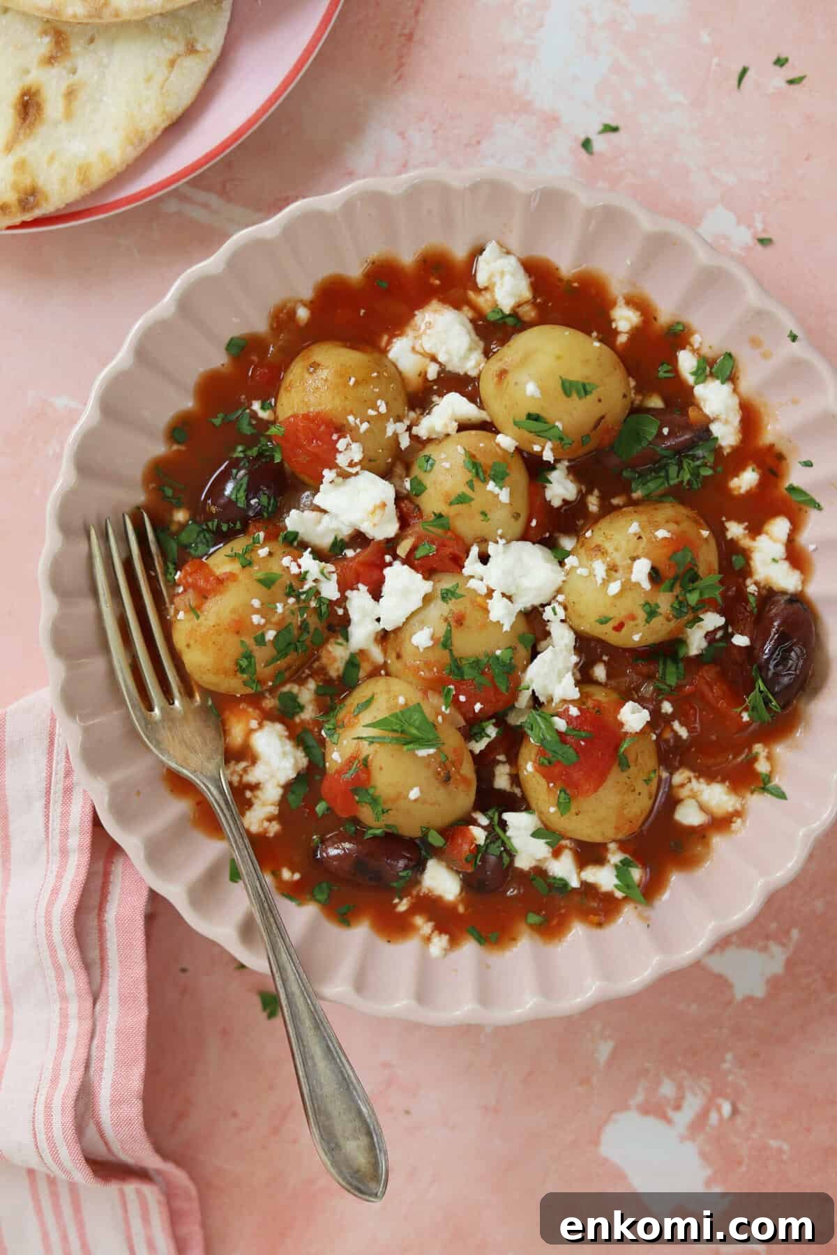 Slow Cooker Greek Potato Stew with Feta and Lemon 3 A bowl of Greek potato stew.