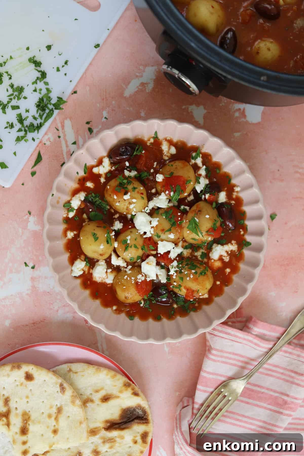 Slow Cooker Greek Potato Stew with Feta and Lemon 7 A bowl of Greek potato stew.