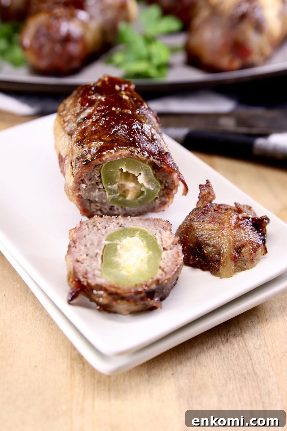 Armadillo Egg - sausage and bacon wrapped jalapeño poppers
