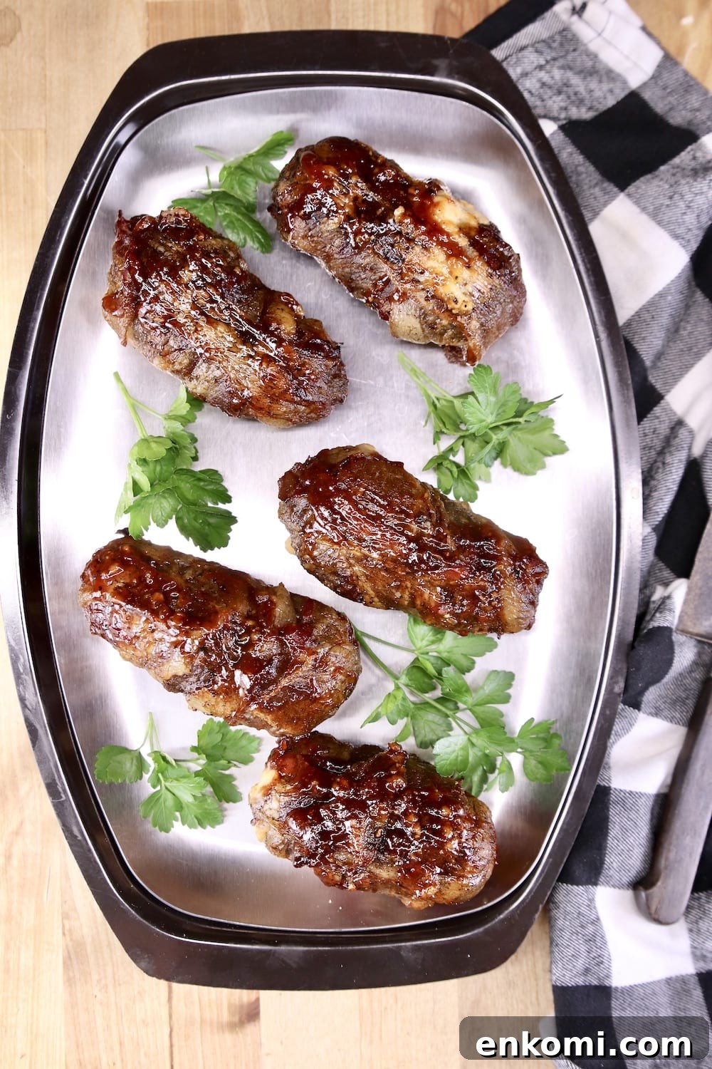 platter of armadillo eggs with parsley