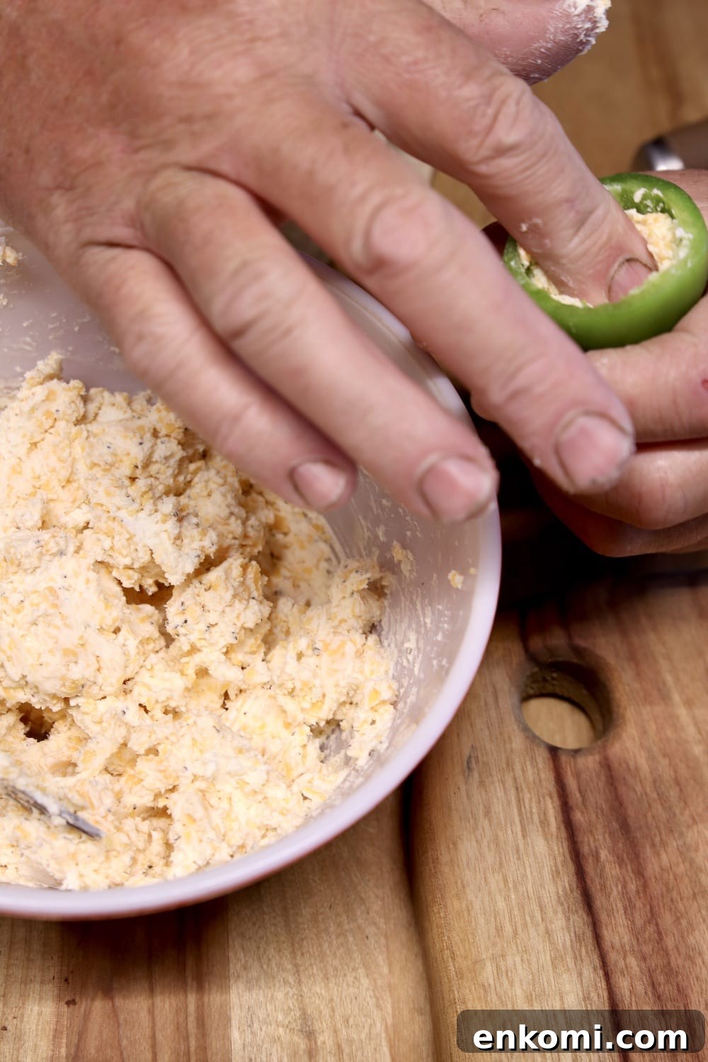 stuffing jalapenos with cream cheese