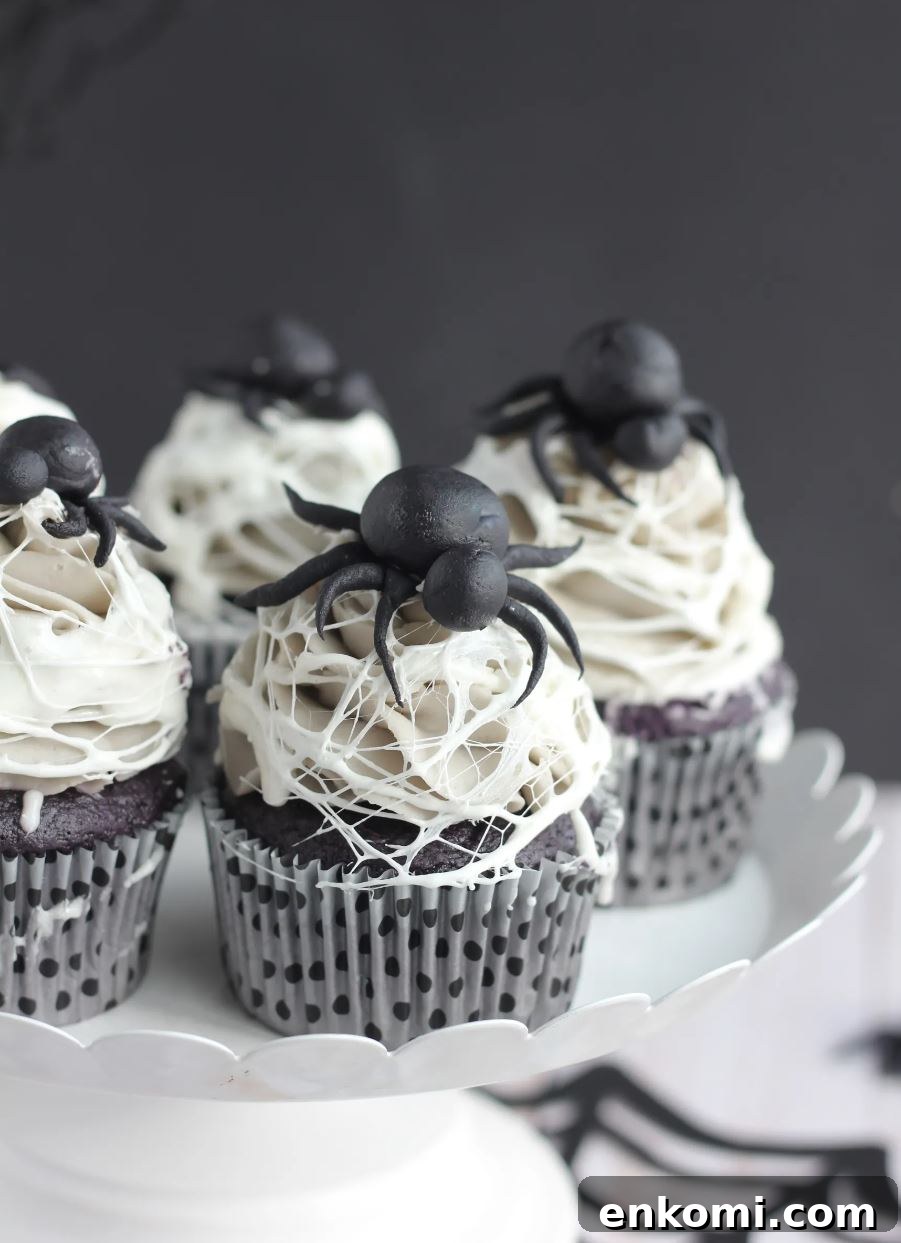 8 Spooky Halloween Cupcake Ideas to Wow Guests 4 Marshmallow spider web cupcakes