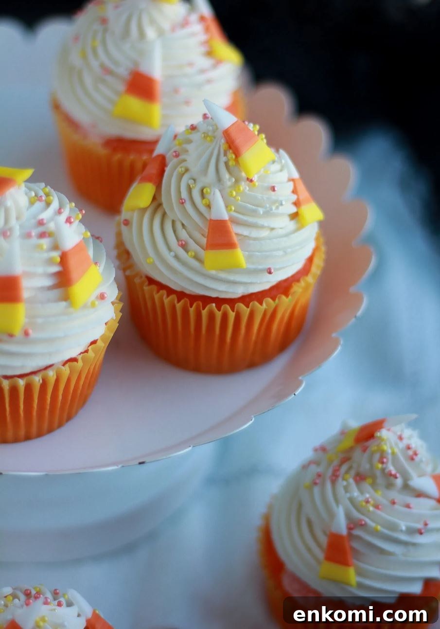 8 Spooky Halloween Cupcake Ideas to Wow Guests 8 Candy corn cupcakes
