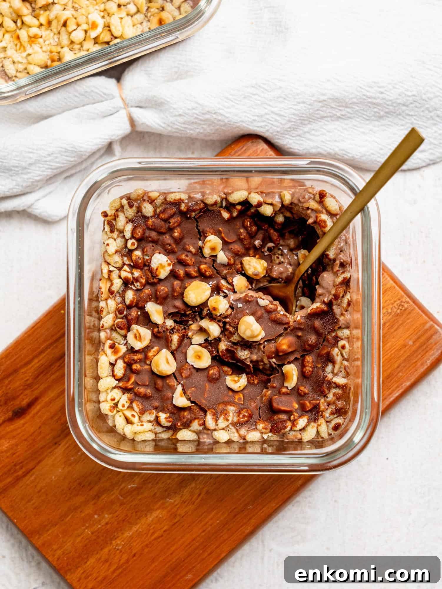Meal-prep Ferrero Rocher Protein Overnight Oats with chocolate shell.