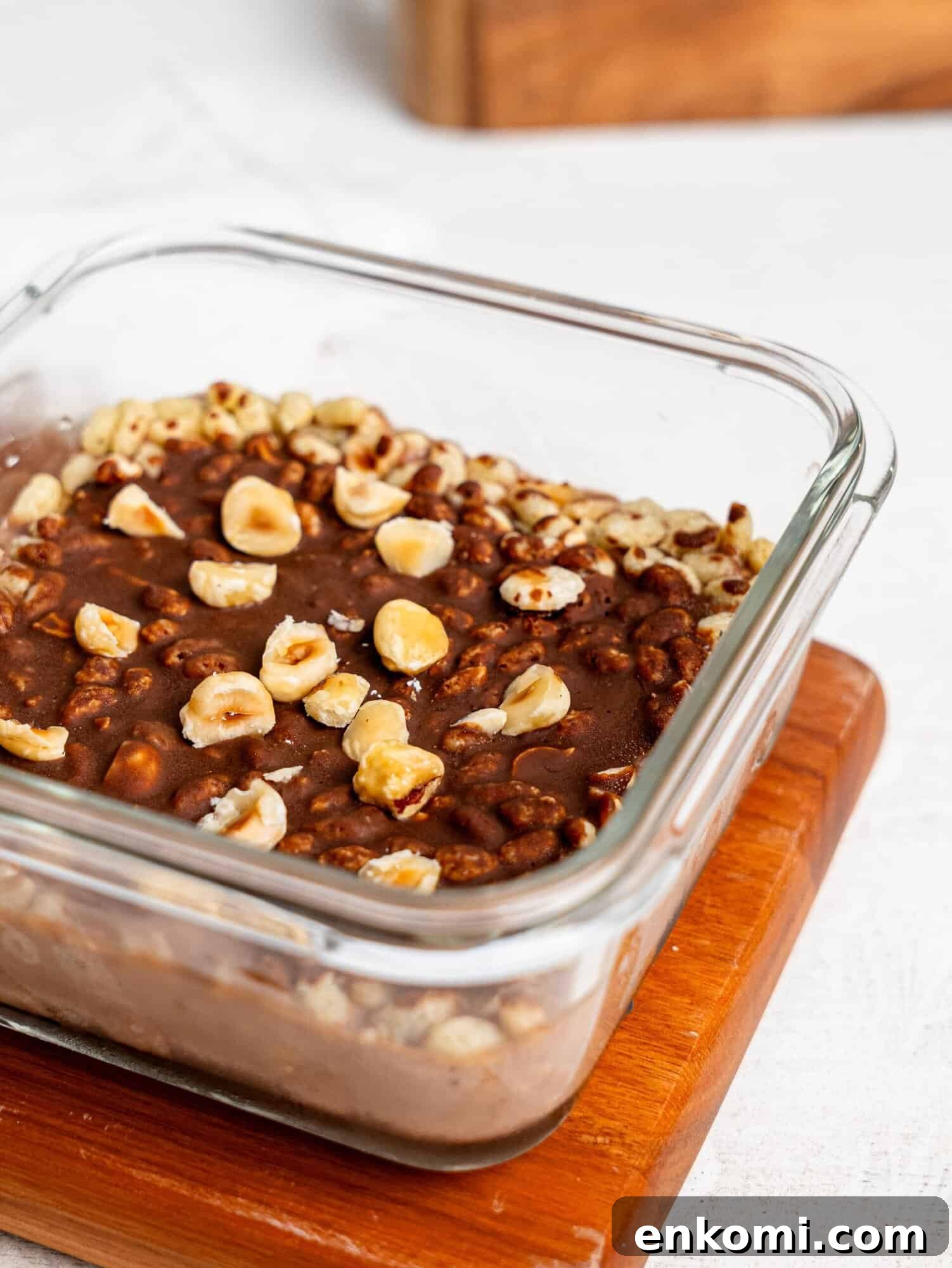Ferrero Rocher Protein Overnight Oats in a glass meal-prep container.
