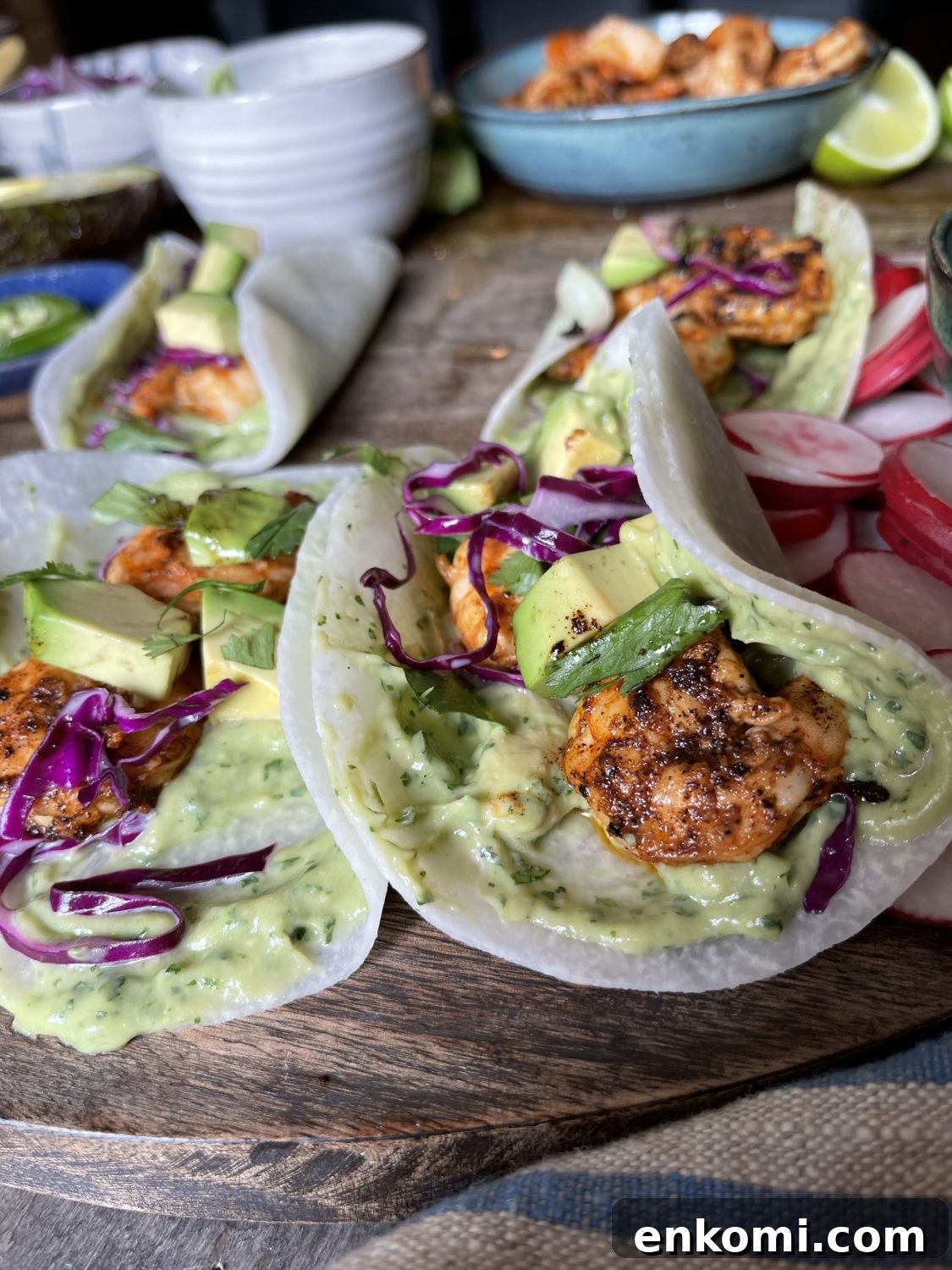 Whole30 Shrimp Tacos with Creamy Avocado Crema 2 close up on taco
