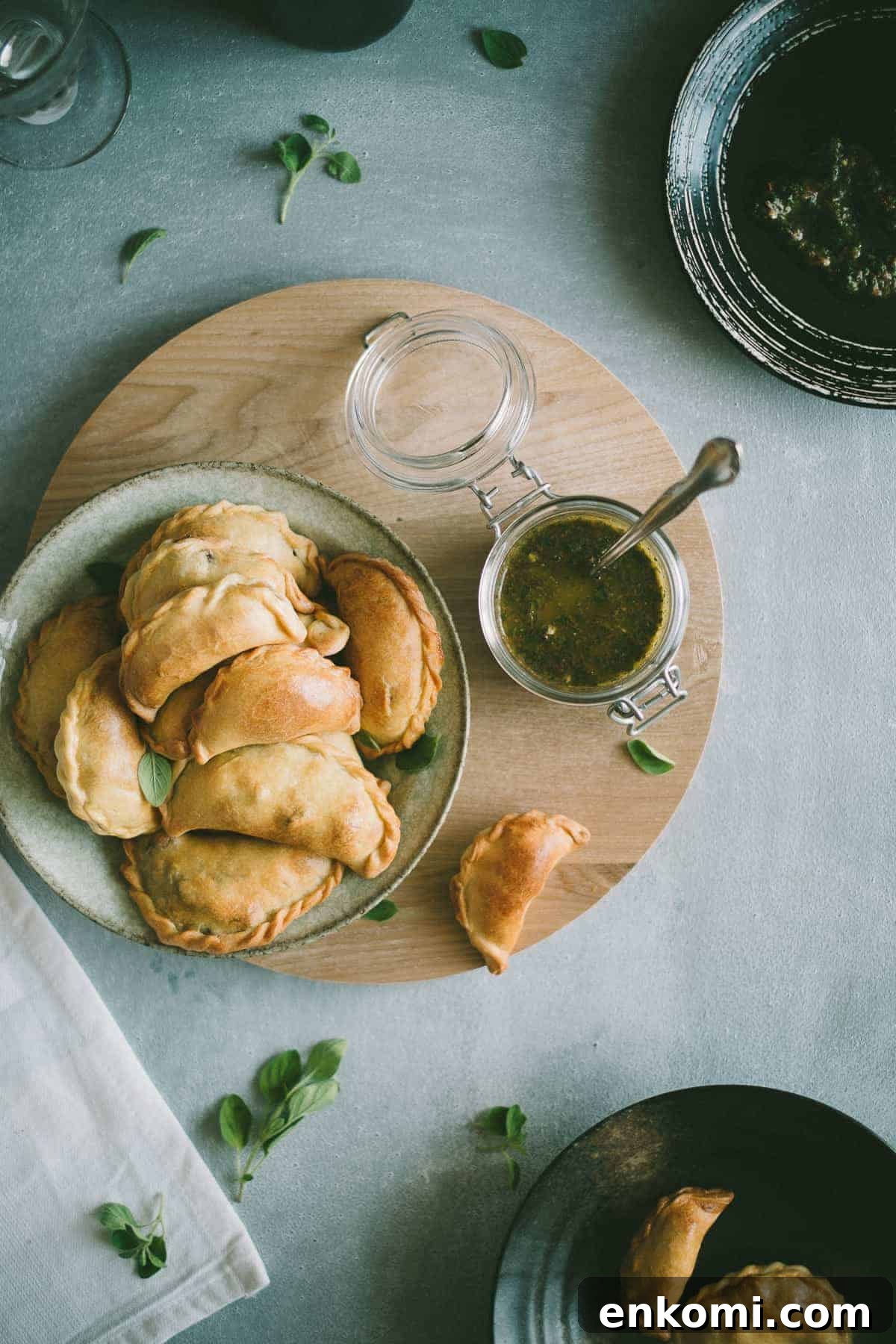 Savory Lamb Empanadas - Homemade Argentine Recipe 2 Lamb Empanadas with an oregano chimichurri dipping sauce
