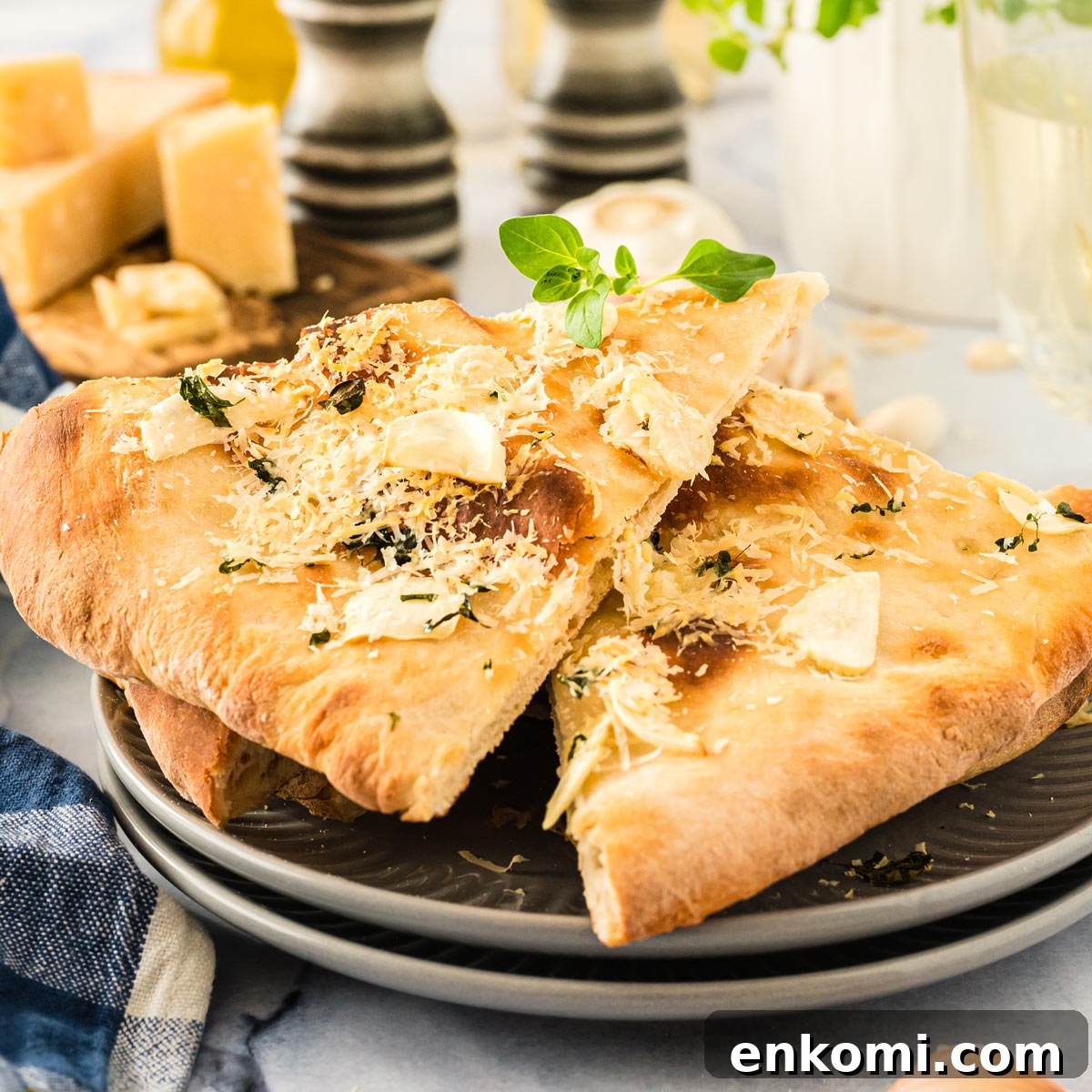 Garlic Lover's Pizza with Homemade Crust Recipe 9 Two slices of homemade garlic pizza on a plate.