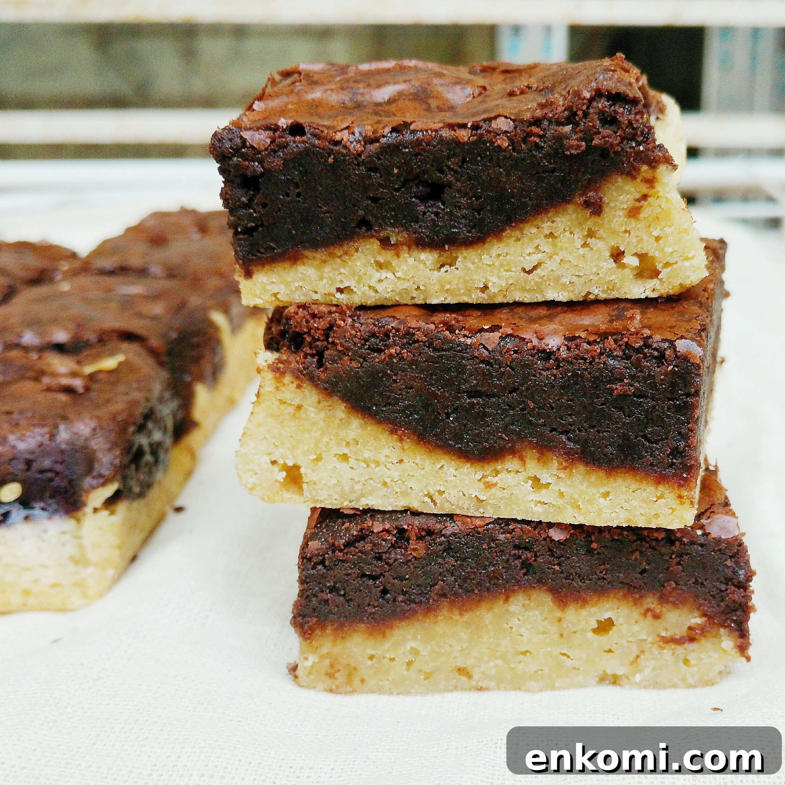Decadent Brondies: Brownie-Blondie Swirl Bars 4 Sliced brondies on a plate