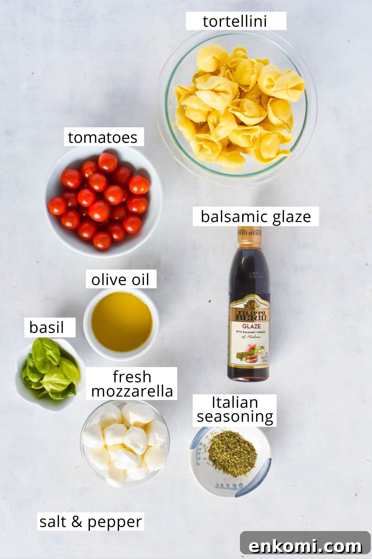 Caprese Tortellini Skewers with Cherry Tomatoes and Basil 3 Ingredients for tortellini caprese skewers laid out