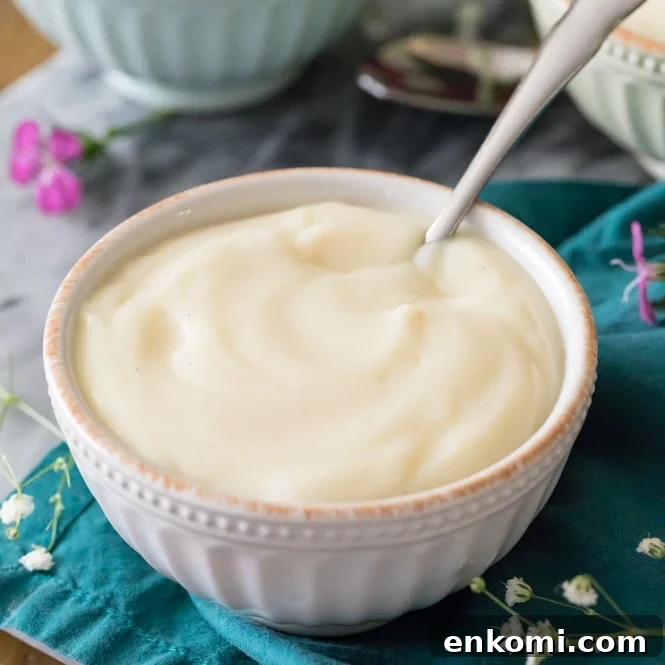 Vanilla pudding in bowl on blue towel
