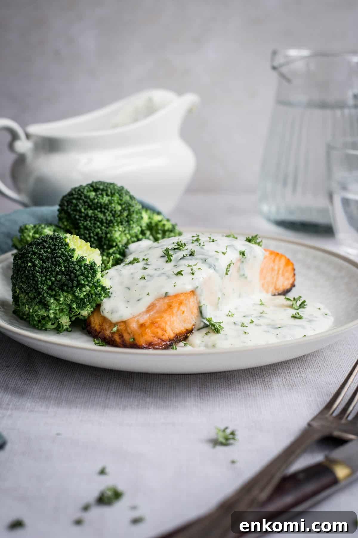Creamy Gluten-Free Parsley Sauce Recipe 2 Parsley sauce drizzled over salmon and broccoli on a plate